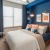 carpeted bedroom with large window