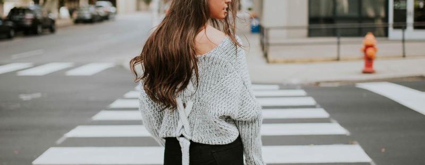 a person walking in a crosswalk
