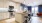 stools at kitchen island with pendant lighting