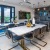 clubhouse kitchen and dining room with tables and chairs