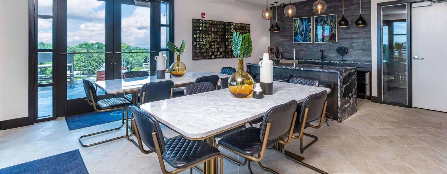 clubhouse kitchen and dining room with tables and chairs